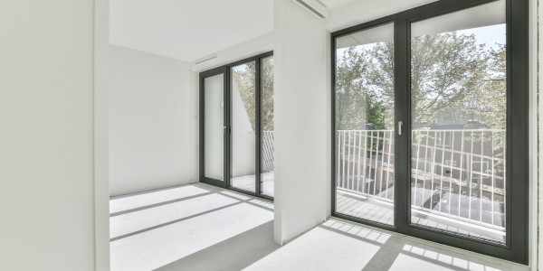 Carpintería Metálica de Aluminio / PVC en Barcelona · Bloqueador Central de Hoja